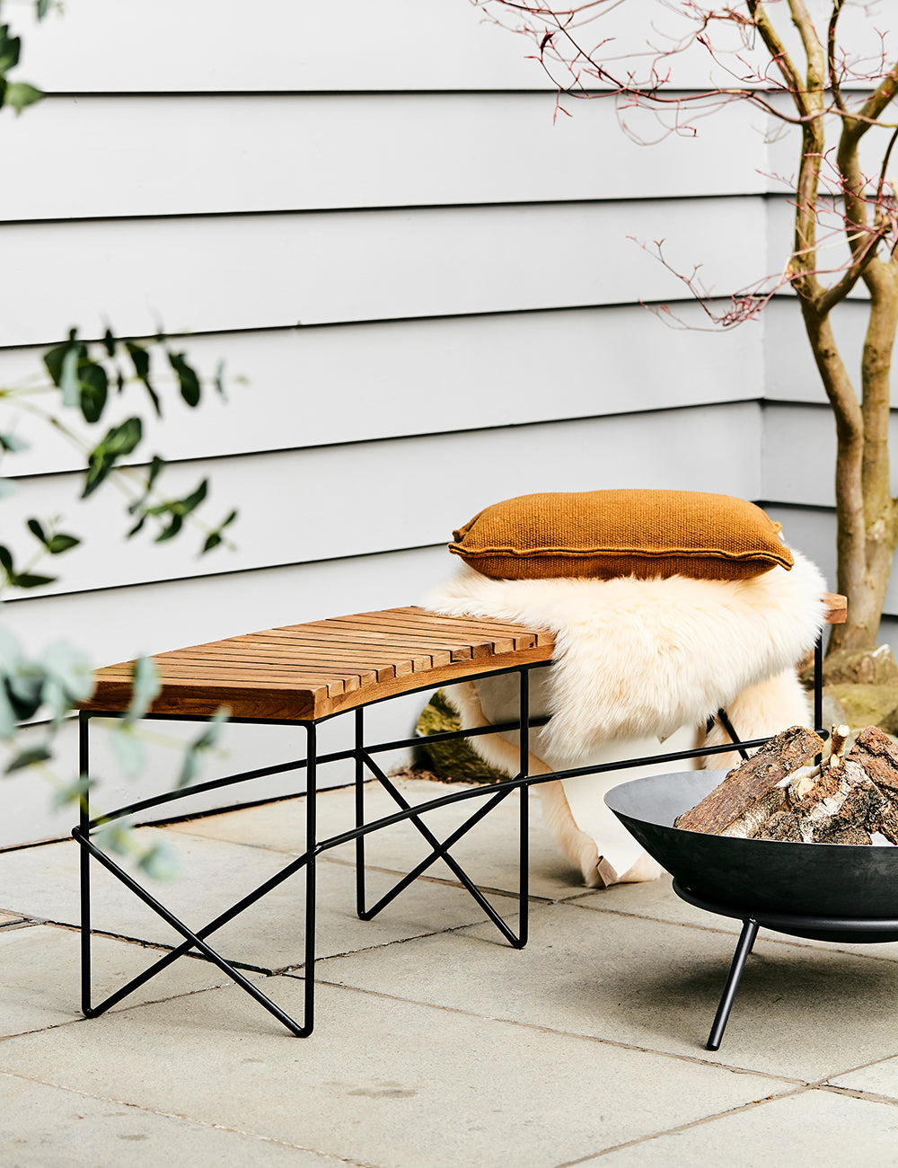 Wooden fire store pit bench